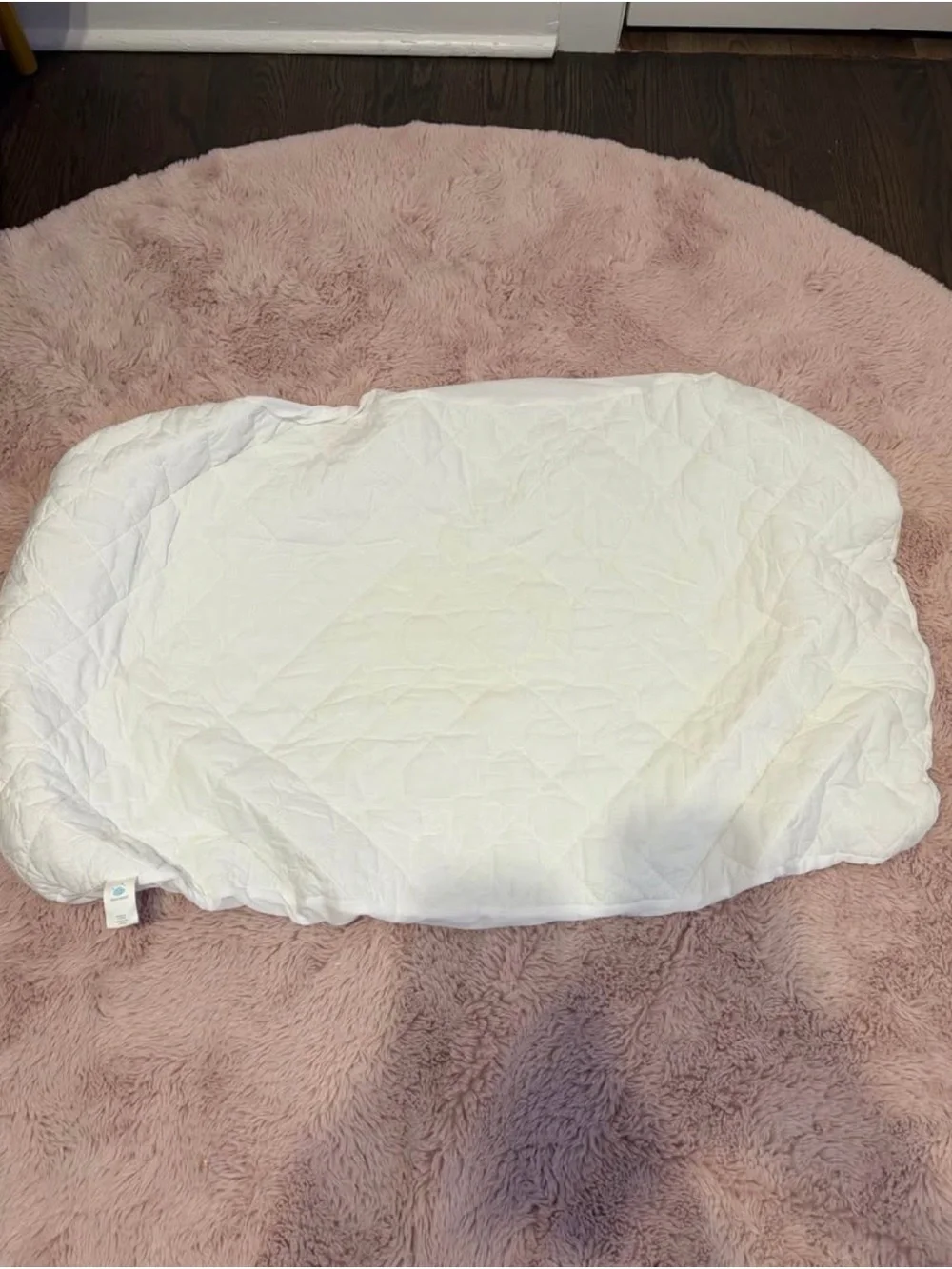 Set of standard crib sheets (4)and crib mattress protectors (3)